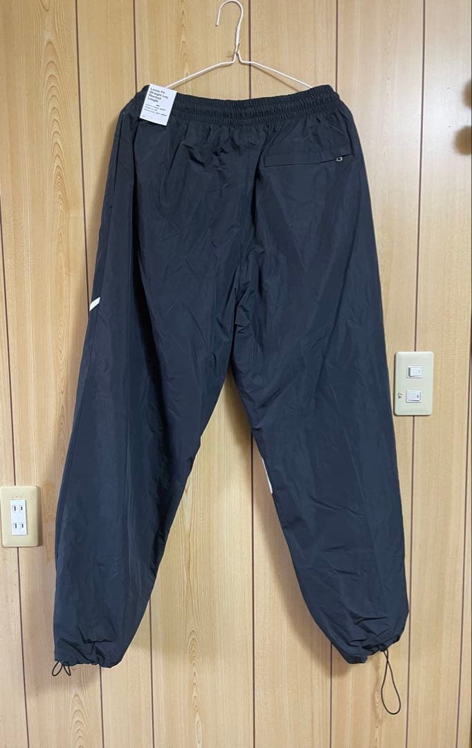 Nike ウィンドブレーカー パンツ ブラック　新品未使用　Lサイズ