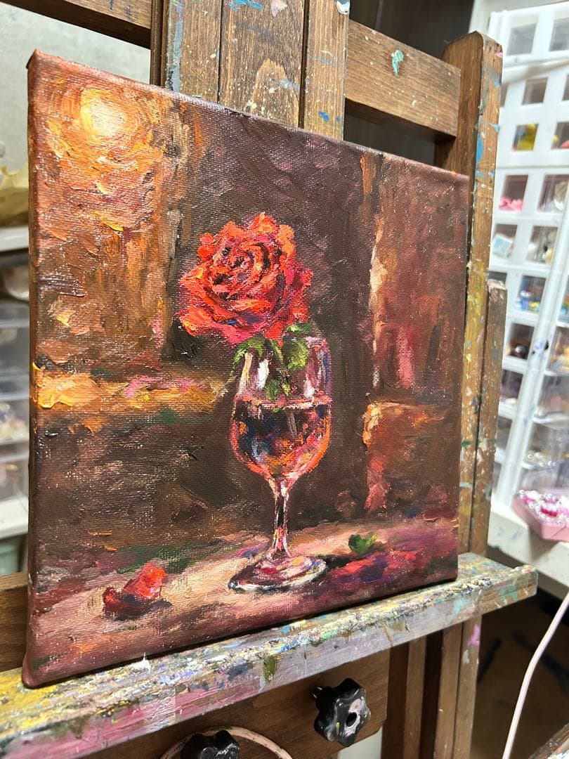 バラの花とグラスの油彩画