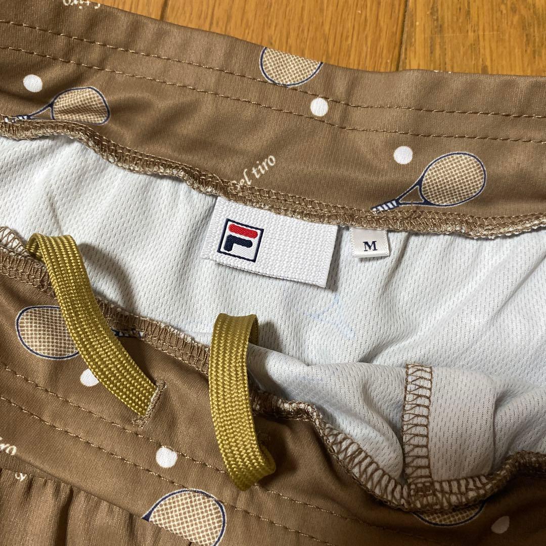 ①FILA フィラ　テニスキュロット　ラケット柄