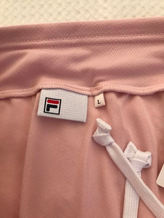 フィラ テニスウェア　ピンク色スコート　Lサイズ　新品