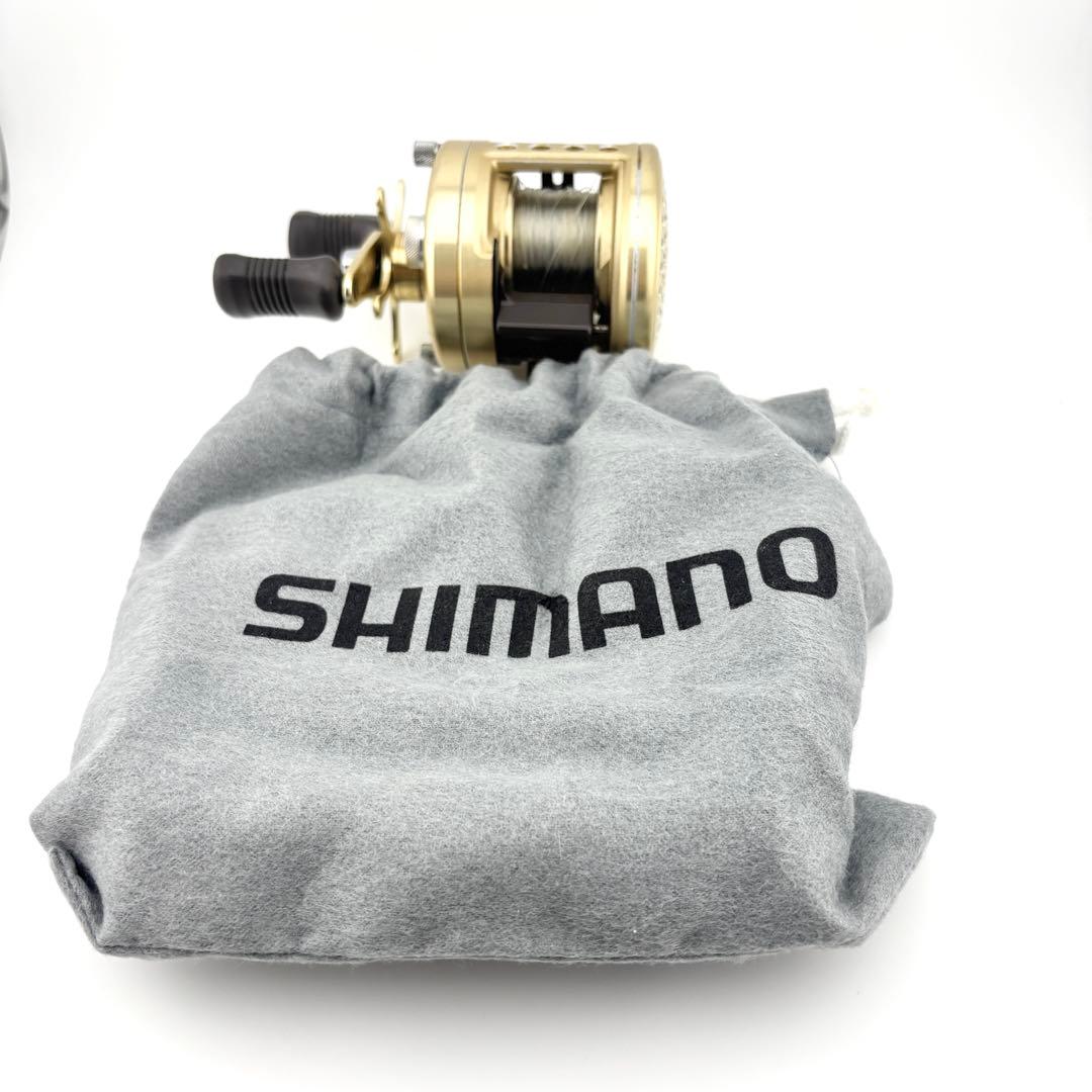 シマノ カルカッタ 201XT 左ハンドル 丸型ベイトリール 巾着袋付き
