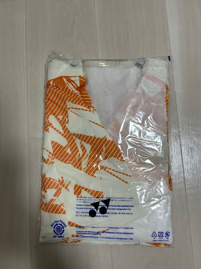 新品未使用YONEX テニス スカート XO オレンジ/ホワイト