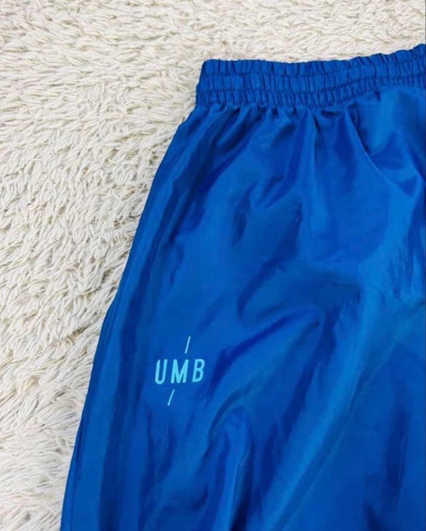 UMB ピステ・ウィンドブレーカー 青・水色