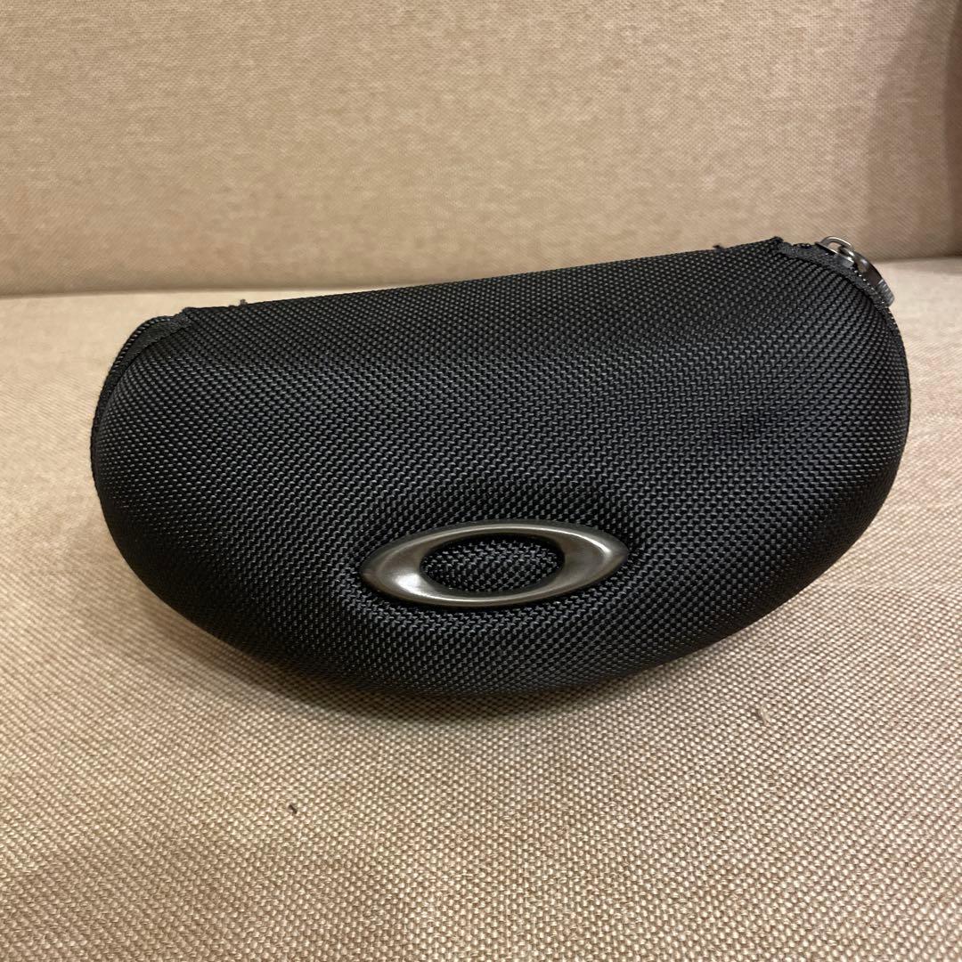 Oakley サングラス ブラックフレーム ゴールドレンズ