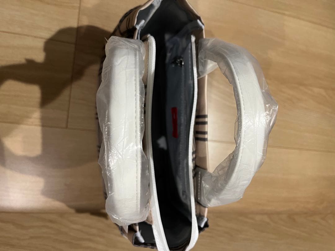 new balance チェック柄 ラウンドバッグ