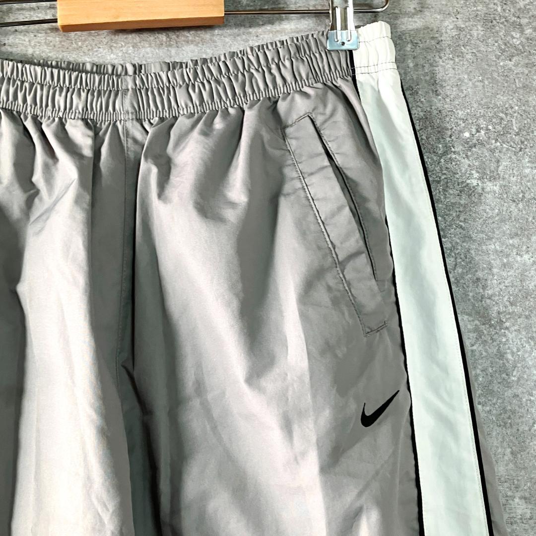 NIKE　トラックパンツ　ジャージ　グレー　ロゴ　ライン　メッシュ　フィットネス