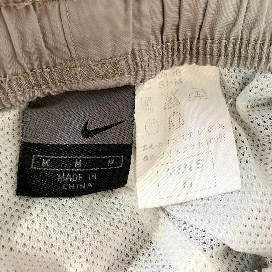 NIKE　トラックパンツ　ジャージ　グレー　ロゴ　ライン　メッシュ　フィットネス