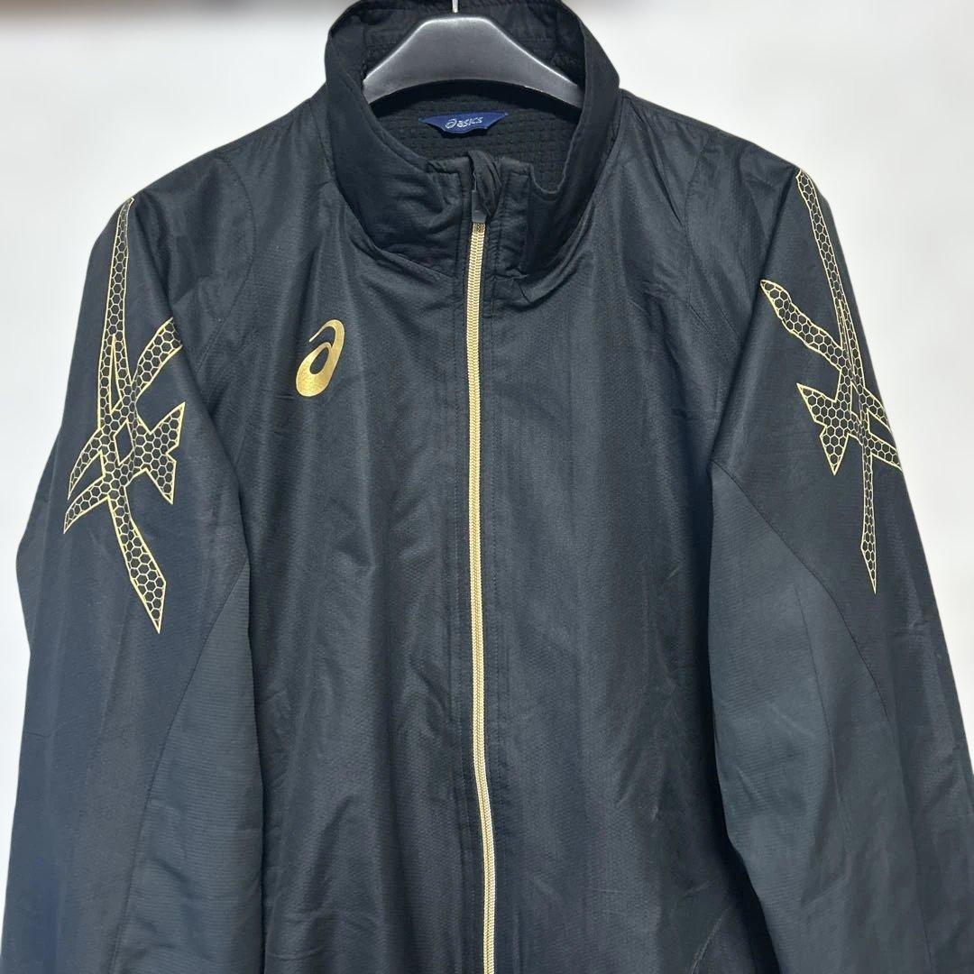 asicsウインドブレーカー セットアップ（上下）XL（O） 黒×金 軽量・保温