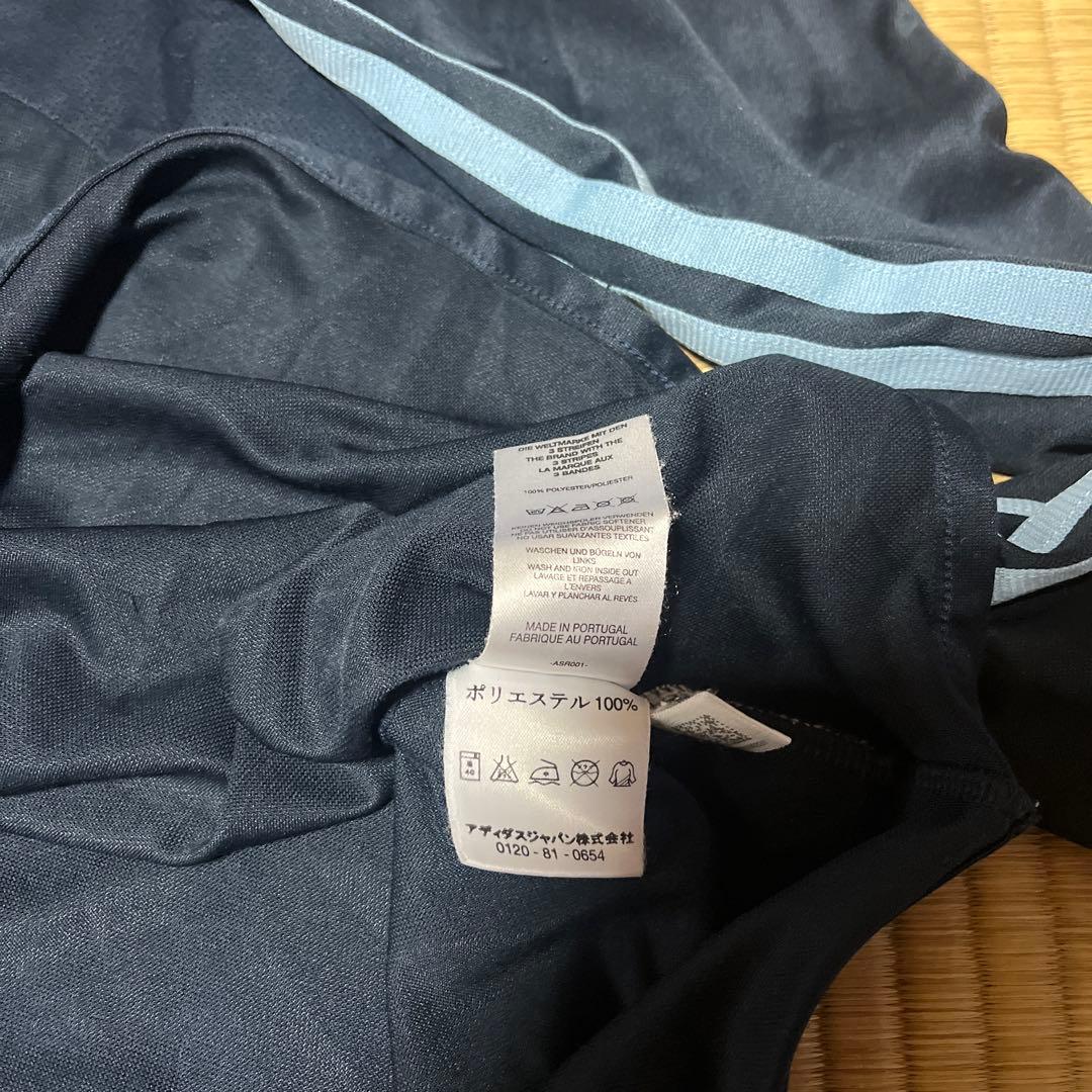 サッカーウェア二枚まとめ売りマンチェスターU Lサイズ　レアル・マドリード2XO