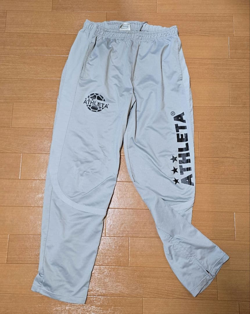 ATHLETA ピステ・ウィンドブレーカー グレー
