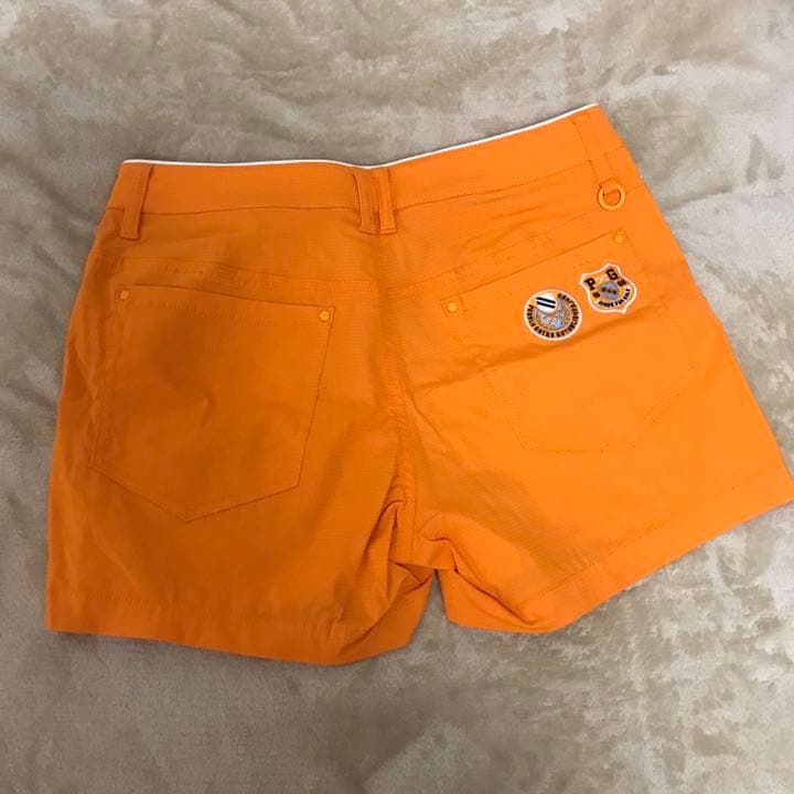 ショートパンツ オレンジ