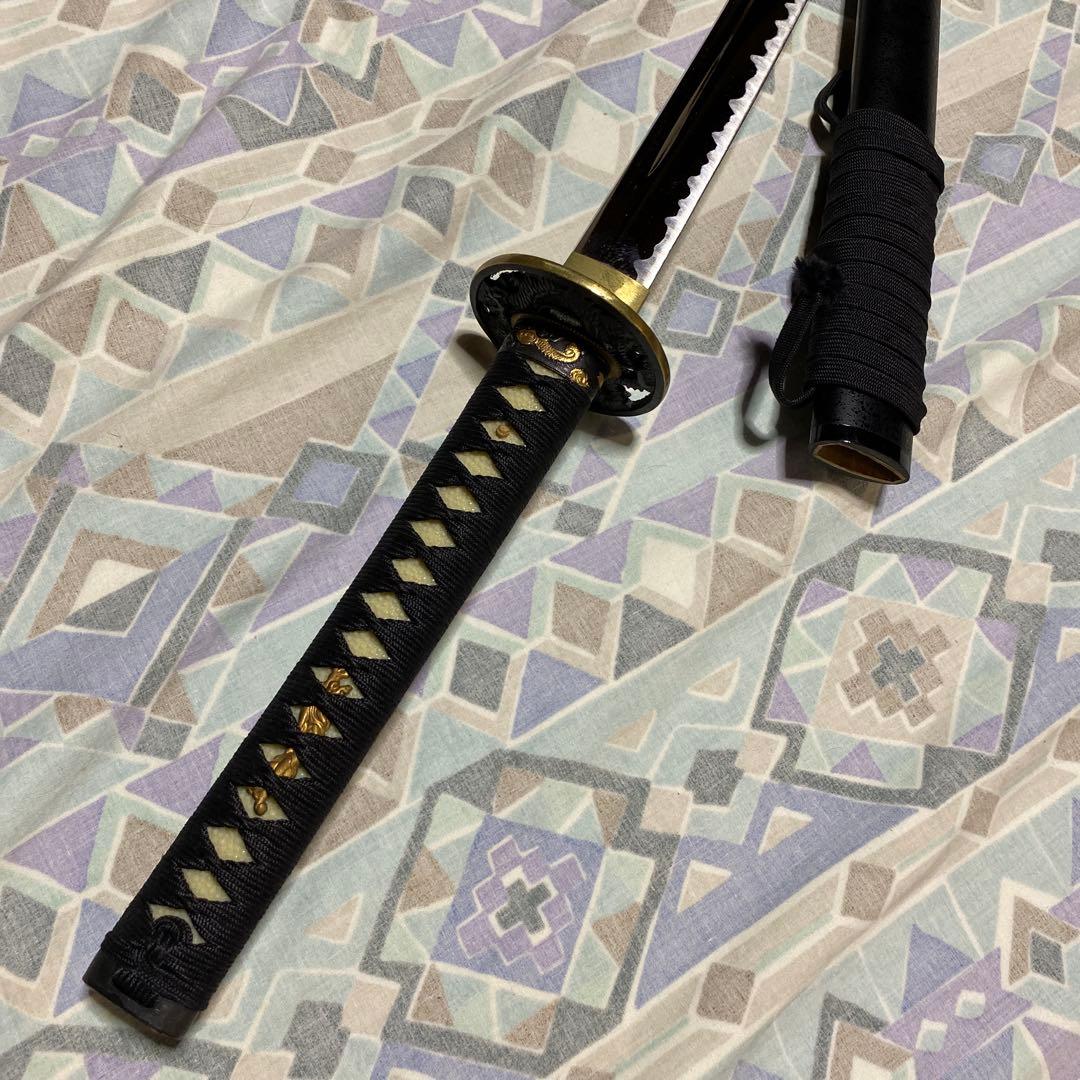 上級居合刀 黒柄 龍彫透し金縁丸鍔 黒梨地鞘