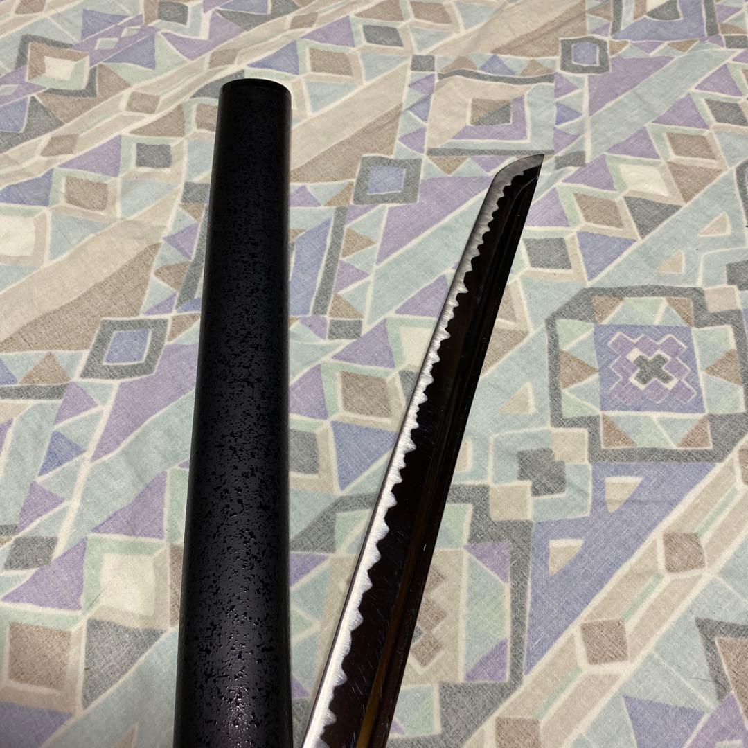 上級居合刀 黒柄 龍彫透し金縁丸鍔 黒梨地鞘