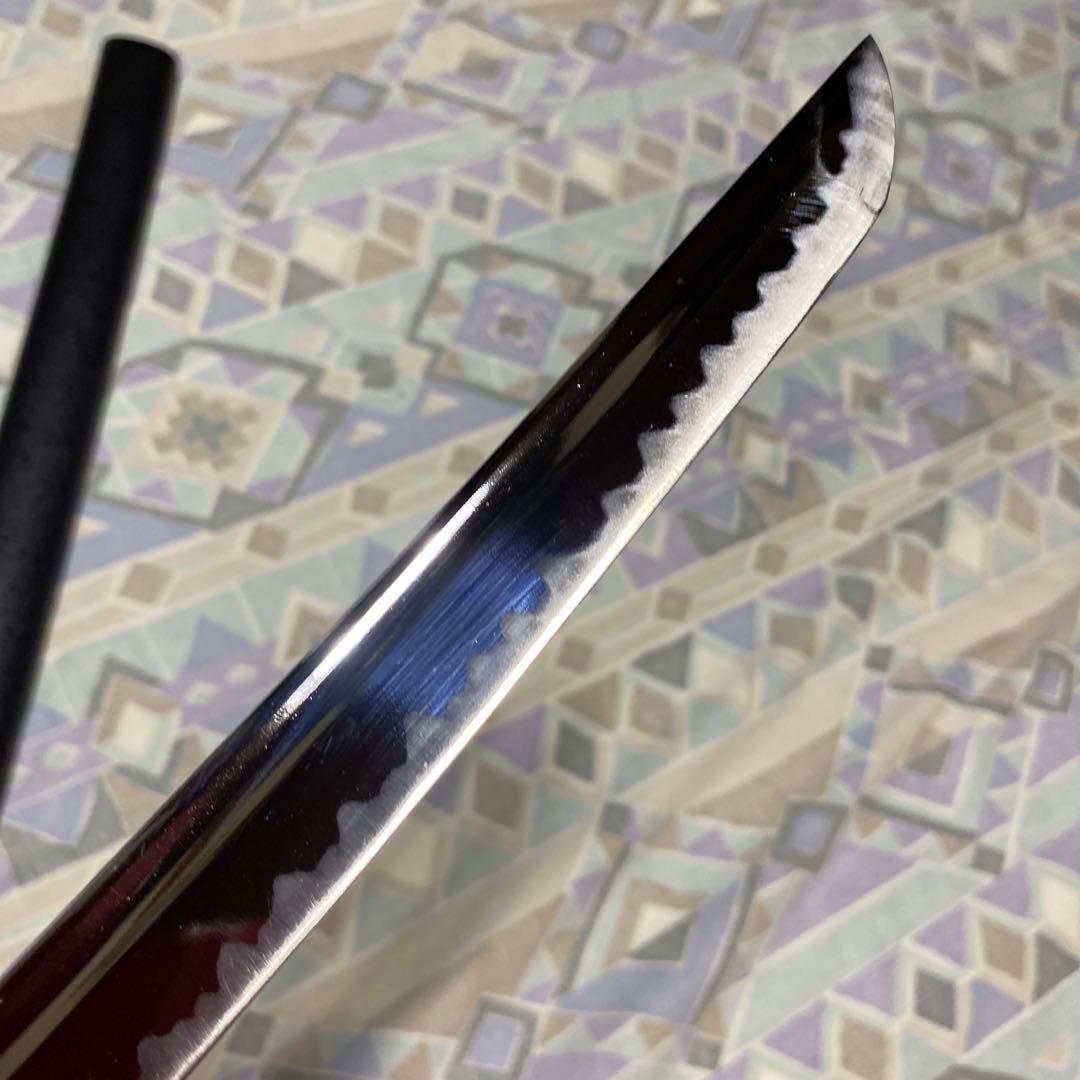 上級居合刀 黒柄 龍彫透し金縁丸鍔 黒梨地鞘