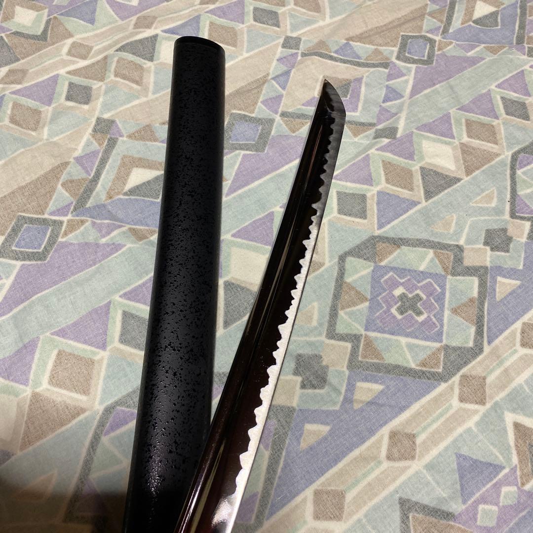 上級居合刀 黒柄 龍彫透し金縁丸鍔 黒梨地鞘
