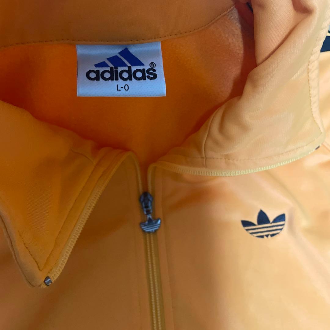 adidas トラックジャケット　オレンジ