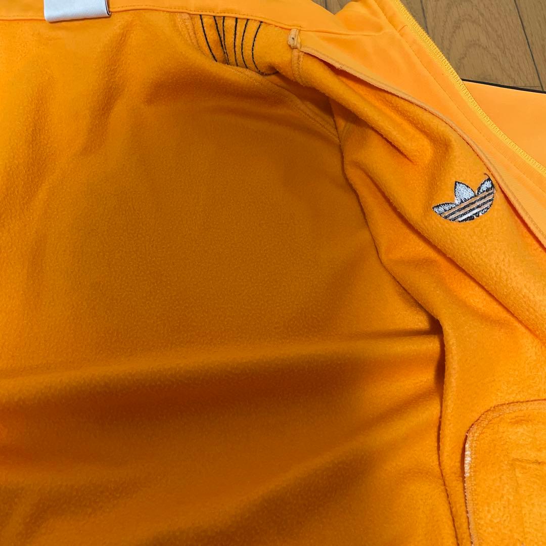 adidas トラックジャケット　オレンジ