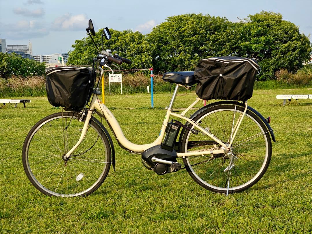 電動アシスト自転車 クリーム色 前後バスケット付き