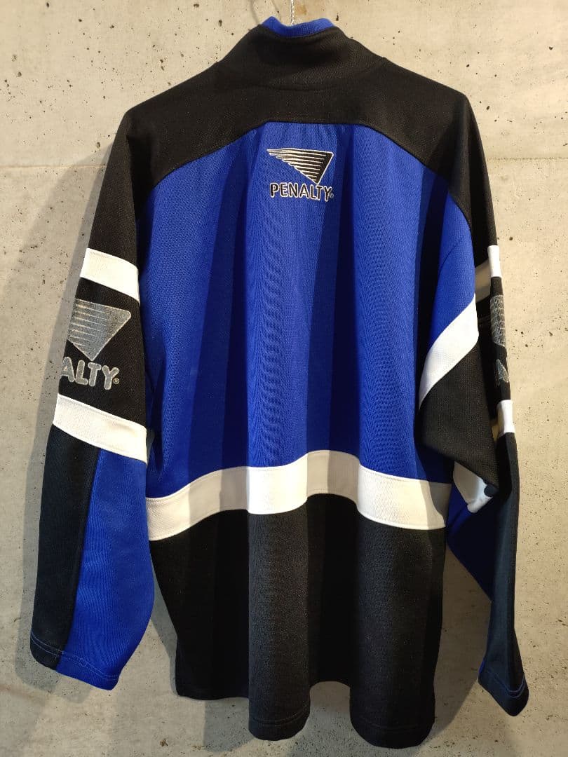 グレミオ ハーフジップJK Penalty