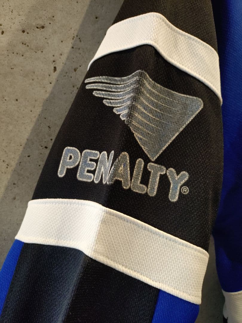 グレミオ ハーフジップJK Penalty