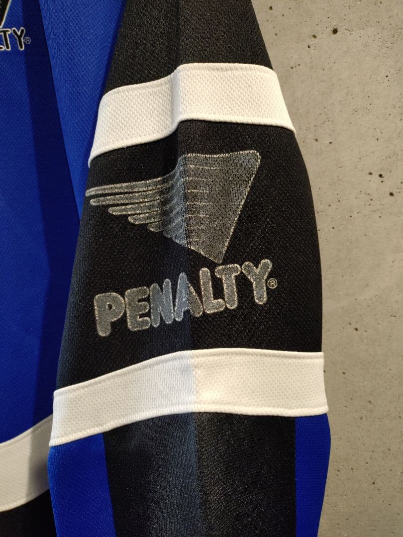 グレミオ ハーフジップJK Penalty