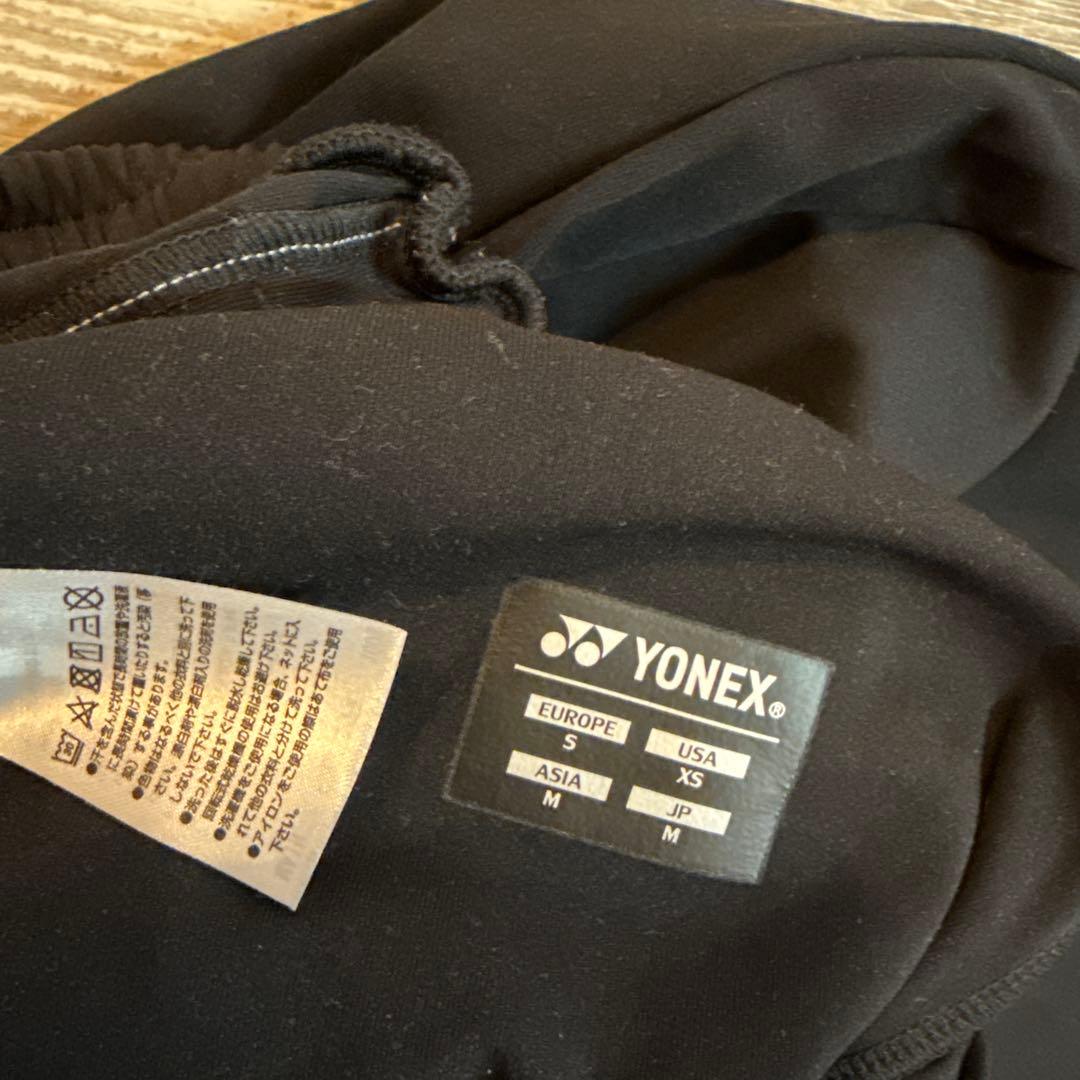 新品　YONEX M ストレッチ ブラックパンツ　ピンクロゴ