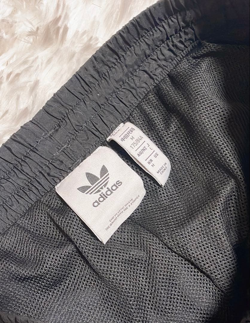 adidas Rekive ナイロントラックパンツ アディダス