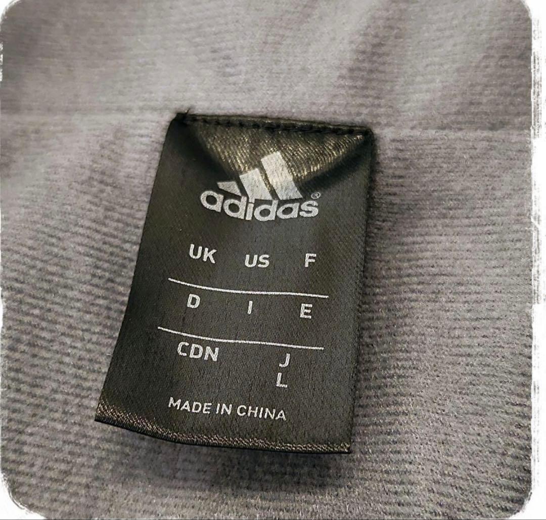 adidasウインドブレーカー　L サイズ上下　黒金
