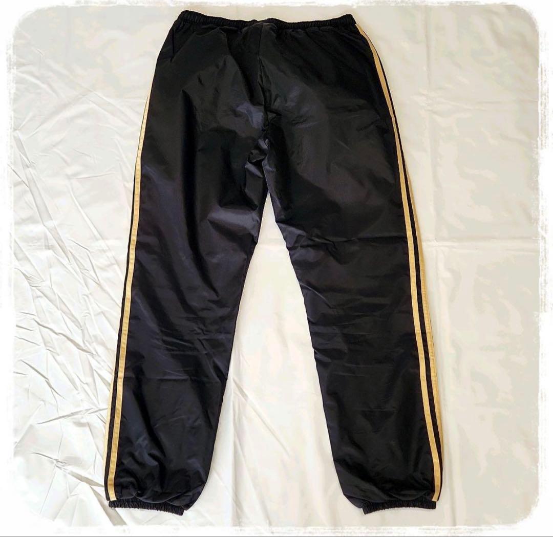 adidasウインドブレーカー　L サイズ上下　黒金