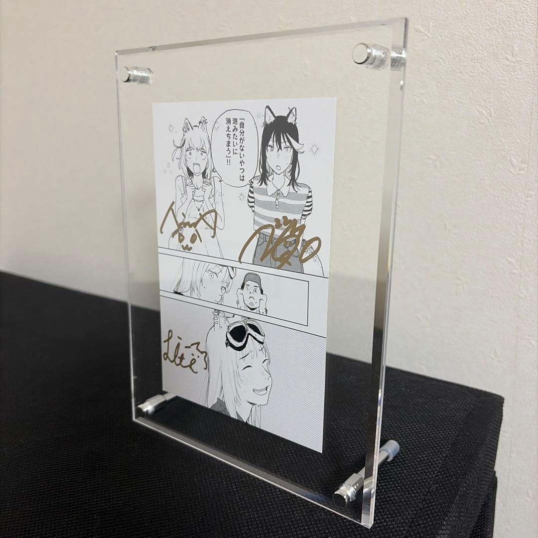 KMNZ サイン