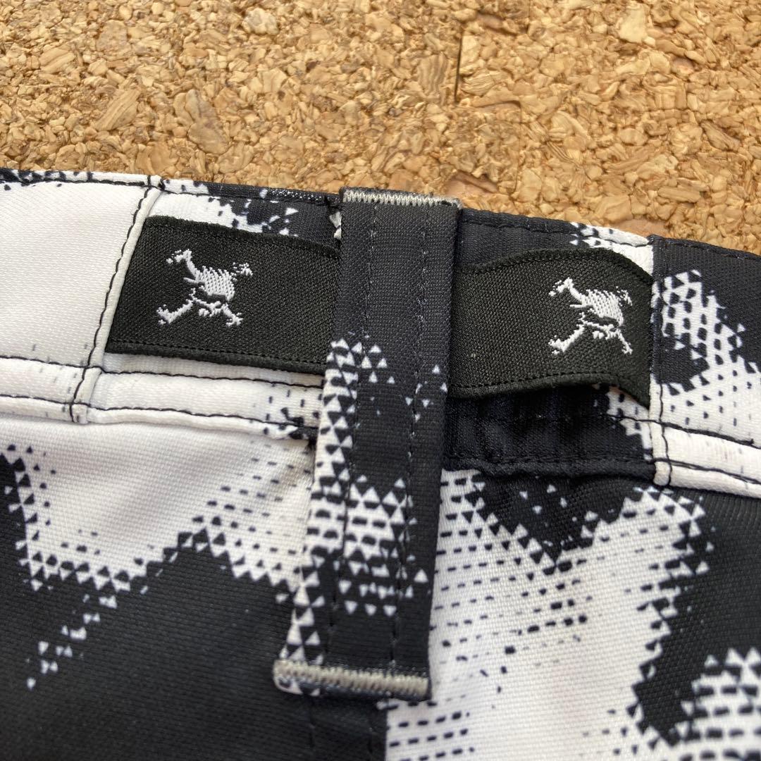 【美品】オークリーOAKLEYゴルフウェア パンツサイズ36メンズ白黒柄撥水春夏