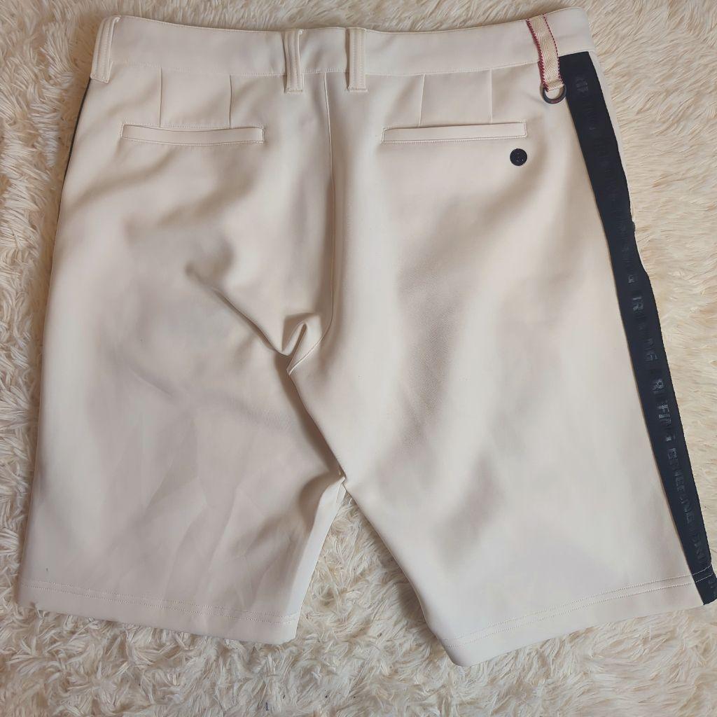 現行 BRIEFING GOLFハーフパンツ XL ベージュ ロゴテープ