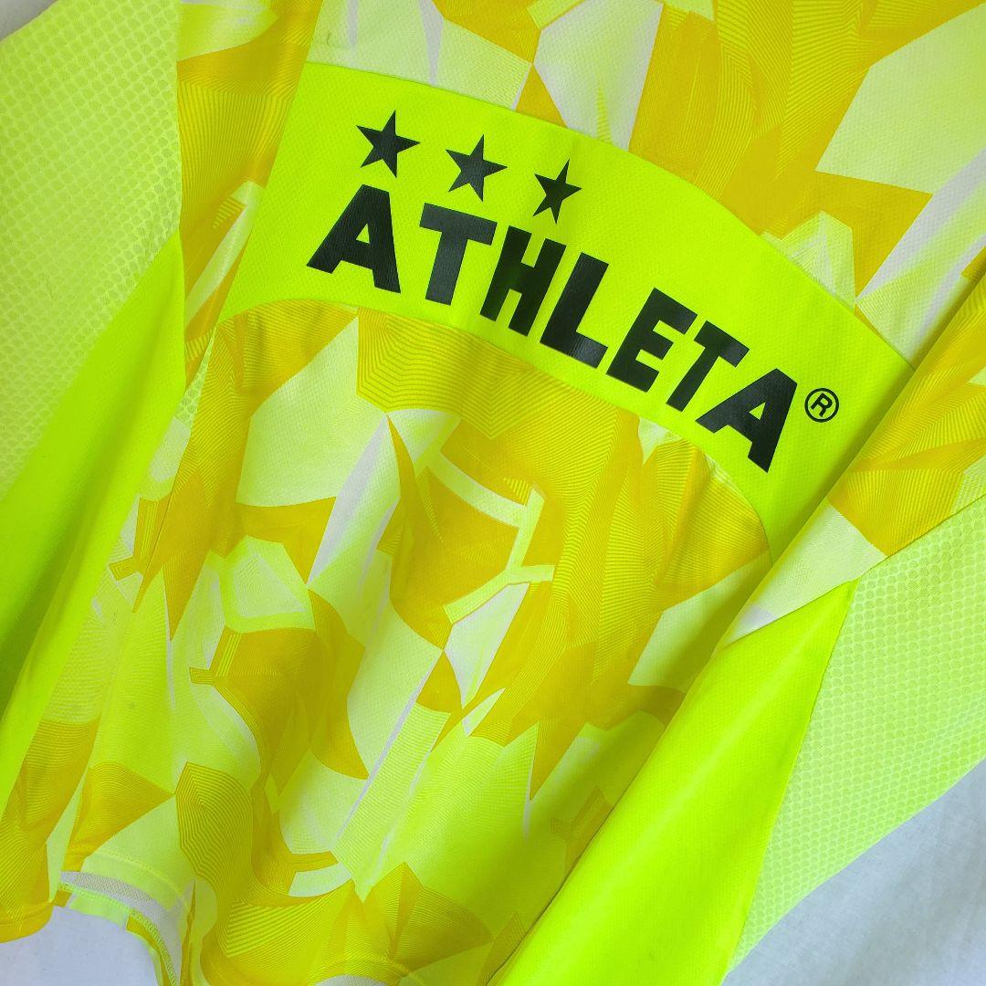 ATHLETA ネオンイエロー 長袖 ウェア ロンT 模様 柄 サッカー