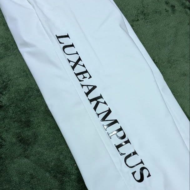 【新品】LUXEAKMPLUS 防風サイドロゴスラックスパンツ Mサイズ