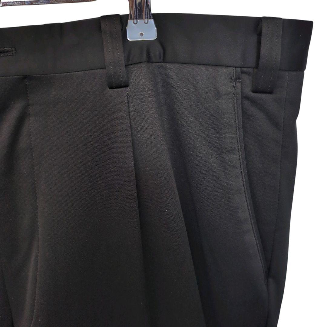 良品 マンシングウェア Munsingwear スラックス 100 黒 蓄熱
