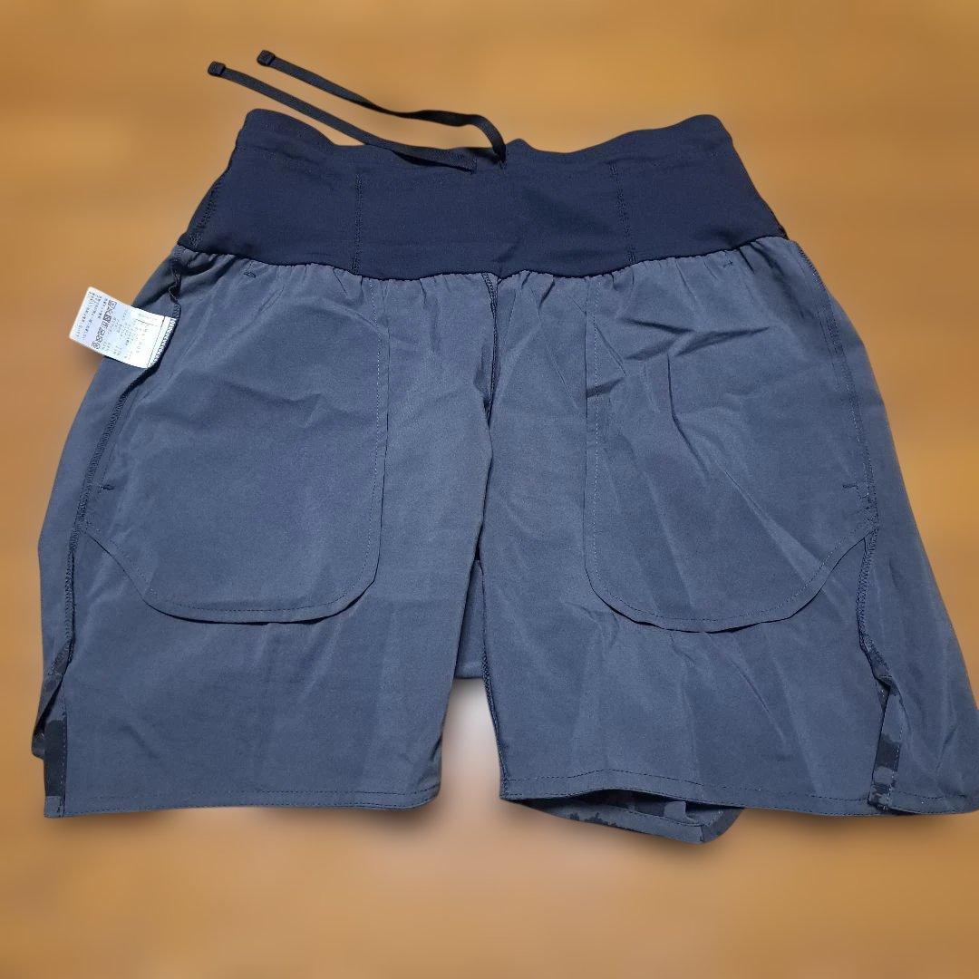 【美品】ノースフェイス ノベルティーフライウェイトレーシングショーツ メンズL