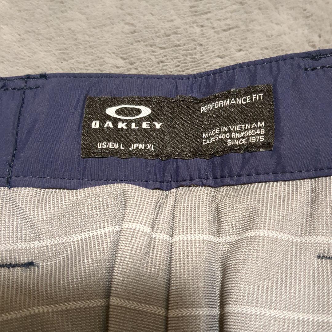 oakley オークリー ゴルフウェア 防風 発熱 ネイビー