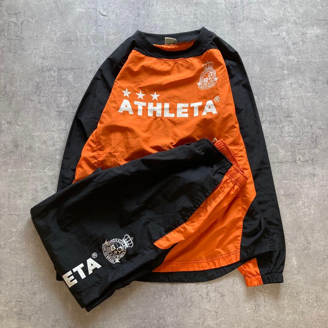 ATHLETA ピステ上下 セットアップ　オレンジ/ブラック　Lサイズ