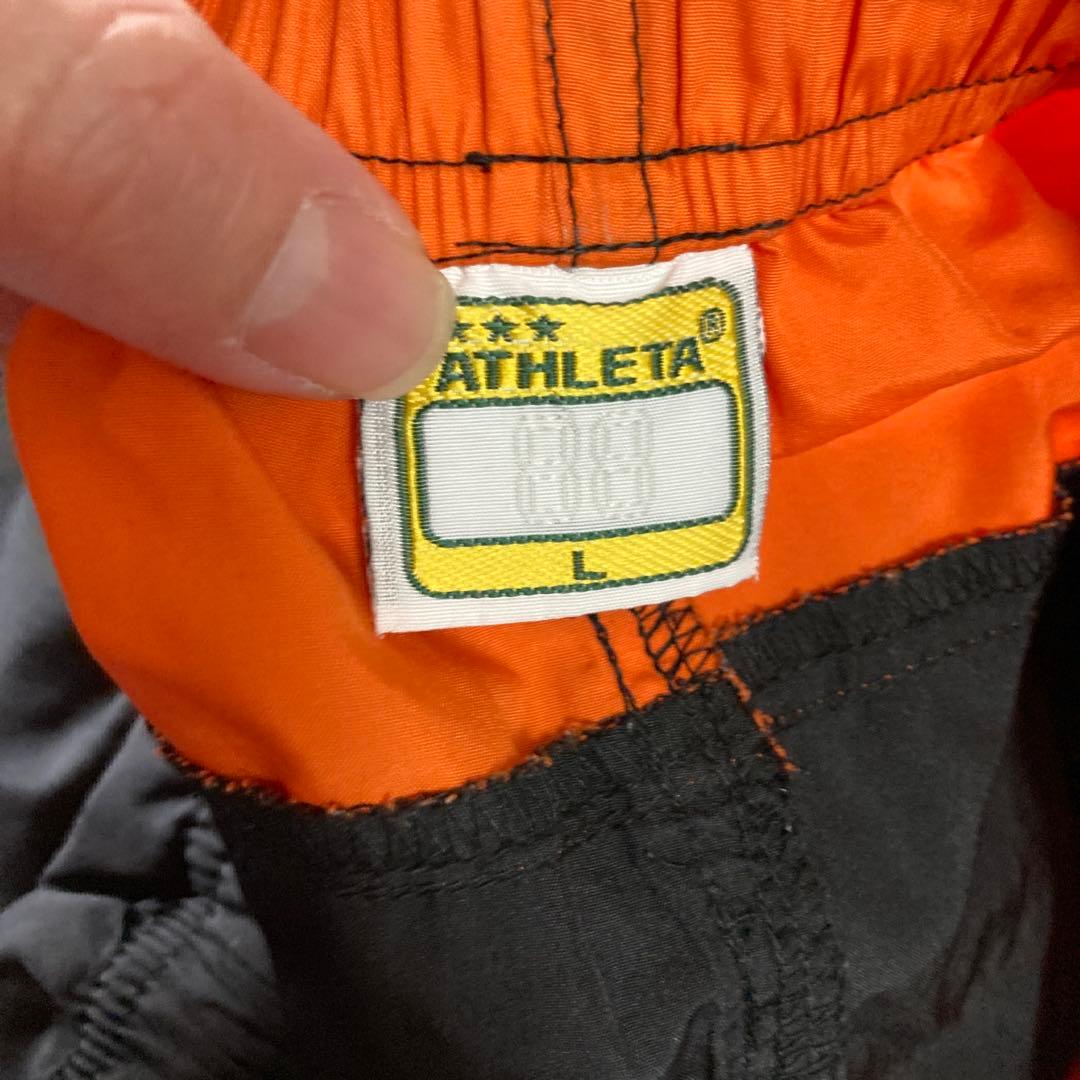 ATHLETA ピステ上下 セットアップ　オレンジ/ブラック　Lサイズ