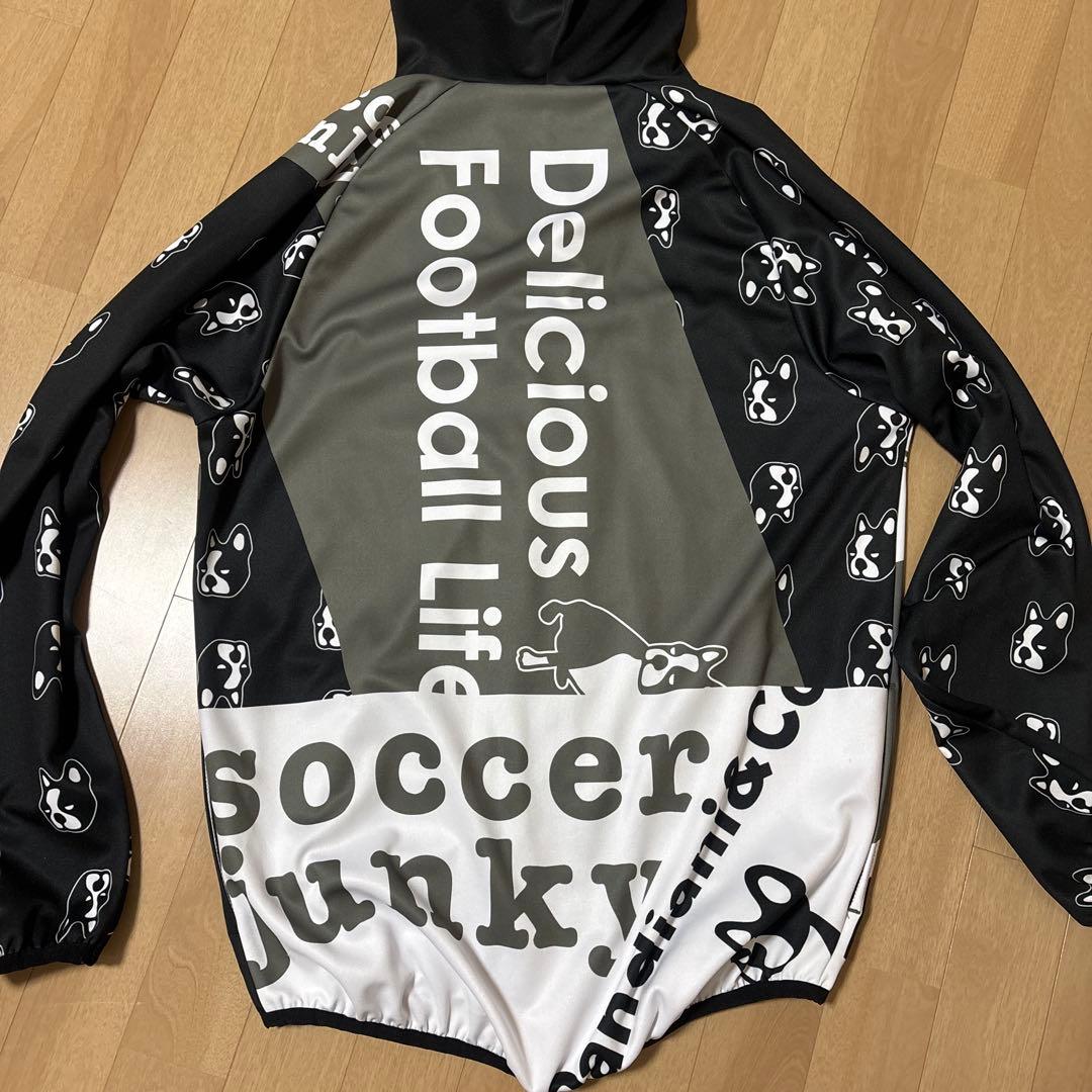 soccer junky フード付きウィンドブレーカー