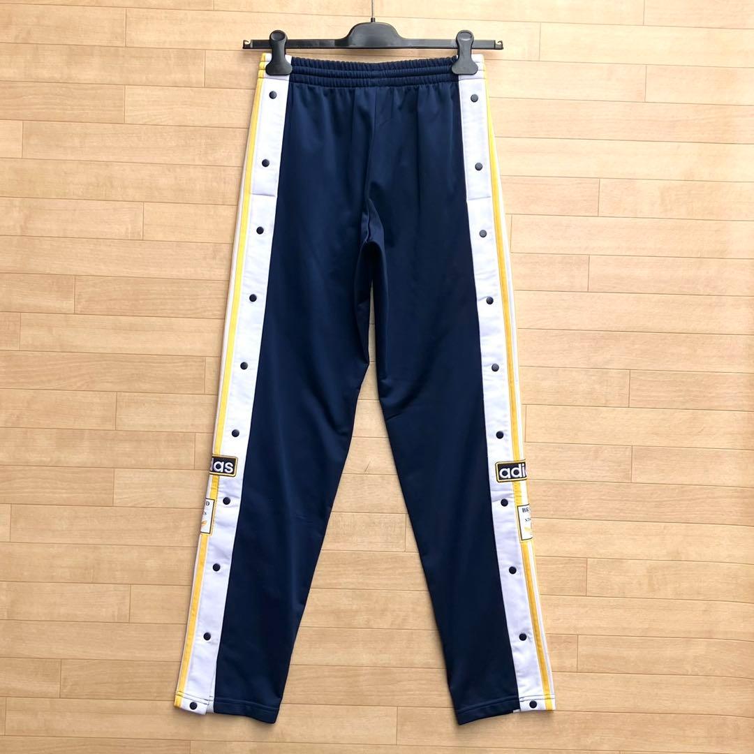 アディダスオリジナルス アディブレイク トラックパンツ ジャージパンツ 紺黄
