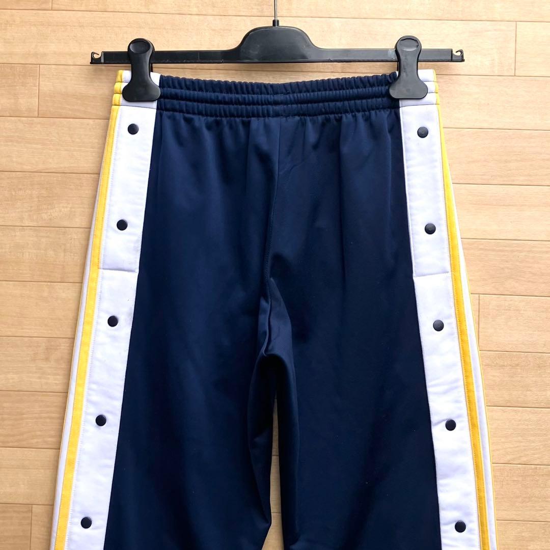 アディダスオリジナルス アディブレイク トラックパンツ ジャージパンツ 紺黄