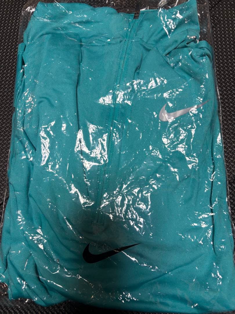 Nike ターコイズ ハーフジップ長袖シャツ