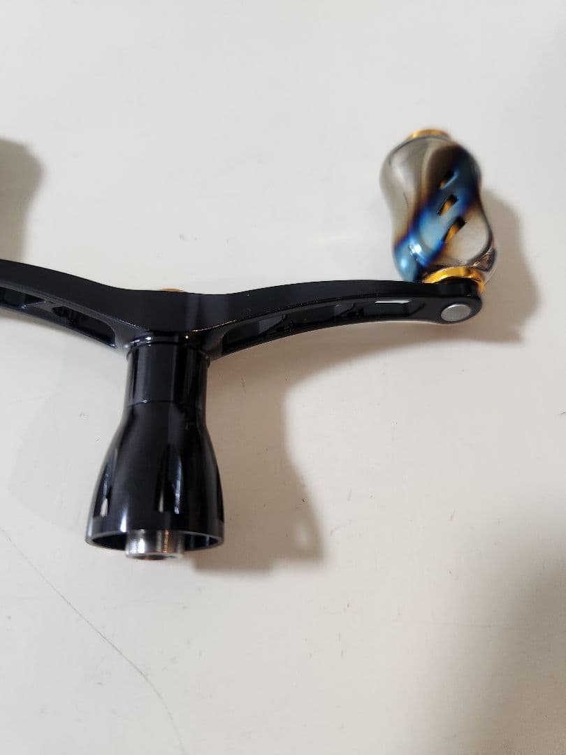 ゴメクサス　ダブルハンドル　98mm ダイワ用　ゴールド/チタンノブ