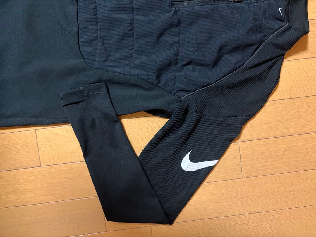 Nike ブラック長袖トップ