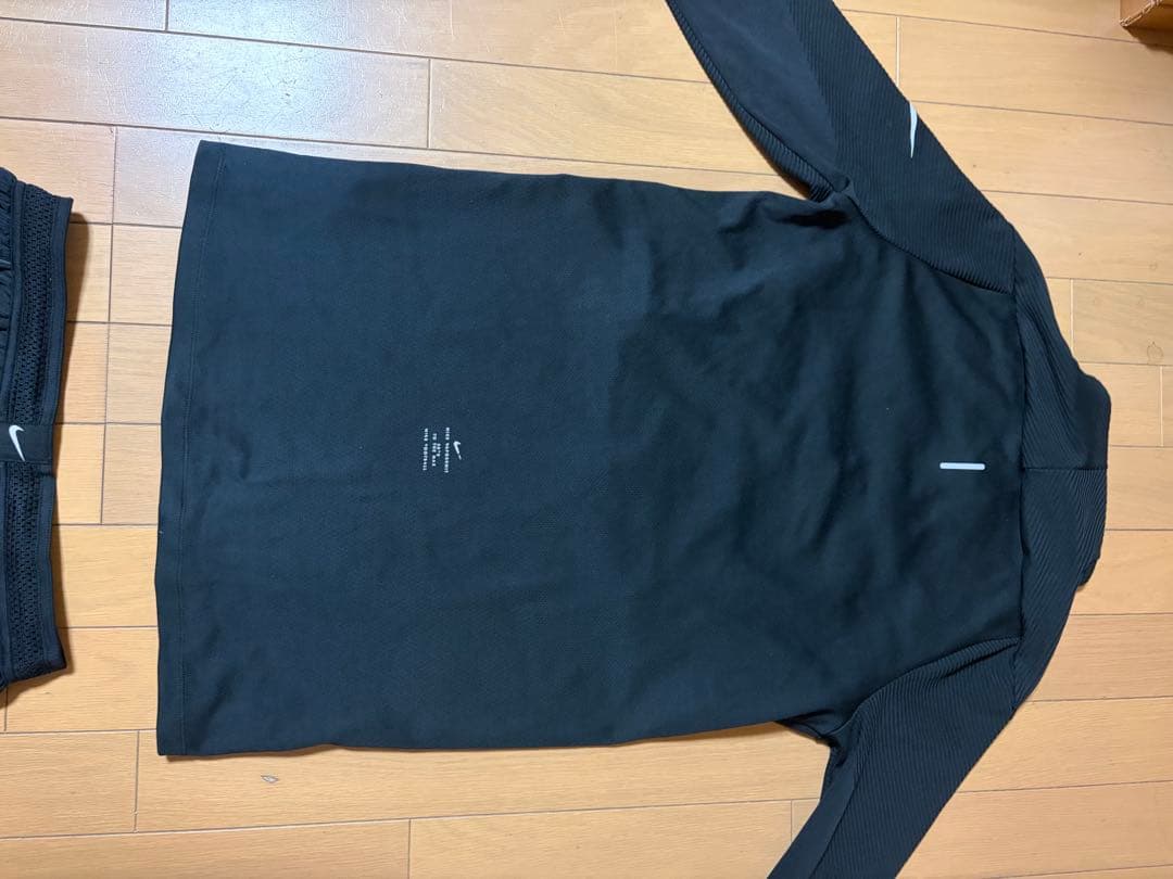 Nike ブラック長袖トップ