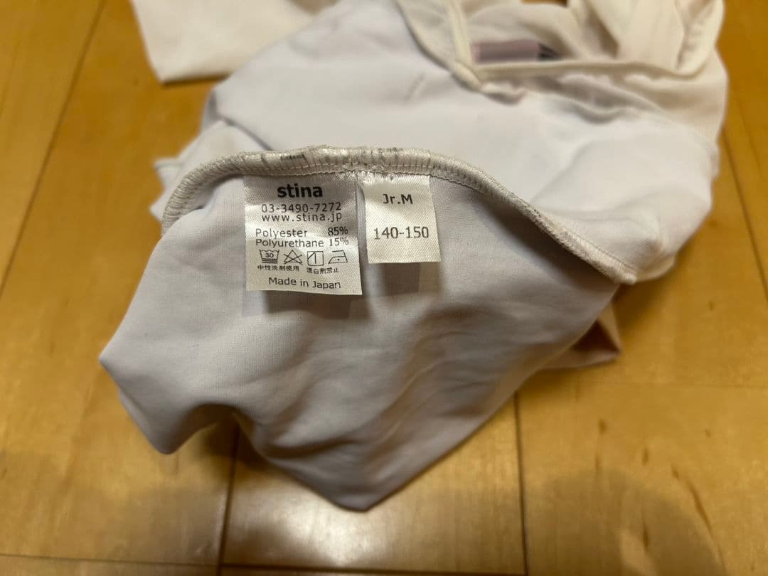stina チェック柄 長袖レオタード Jr.M 140-150