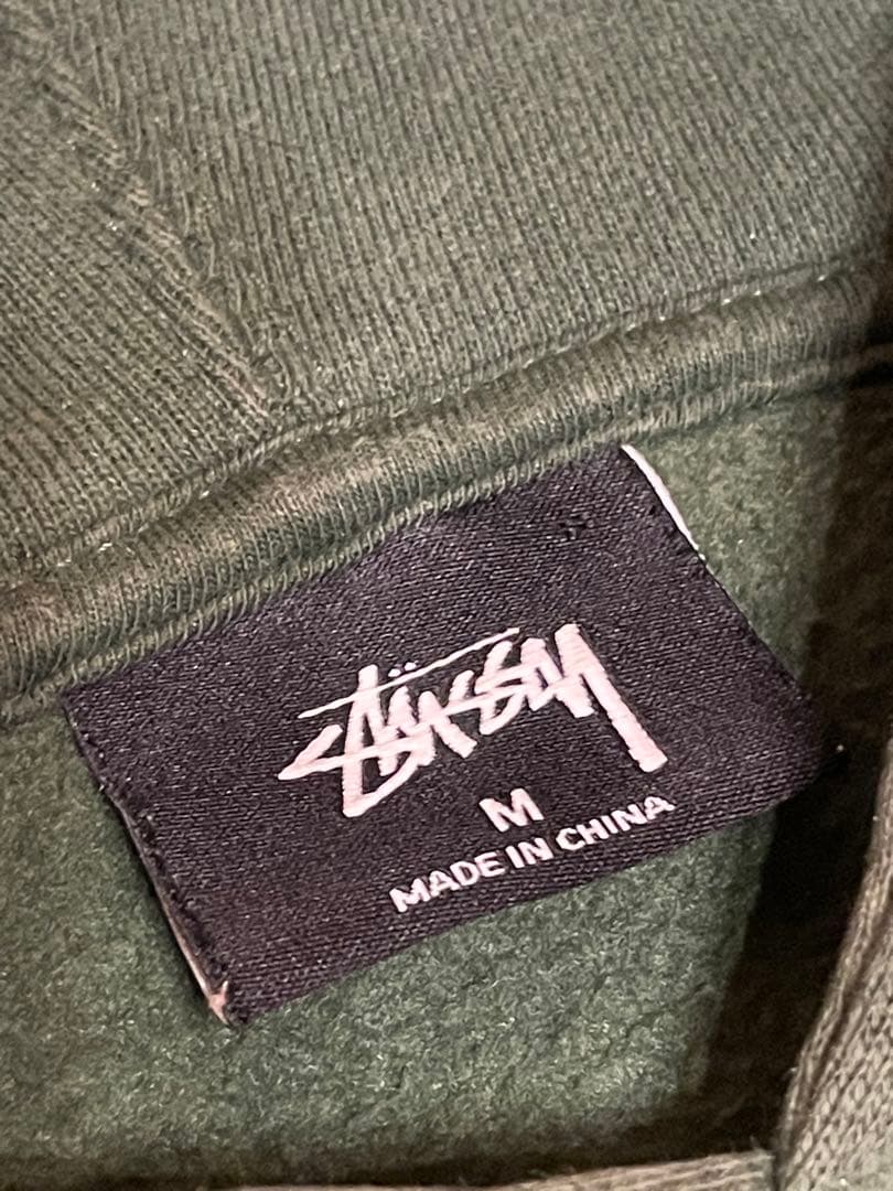 Stussy オリーブ フードスウェット