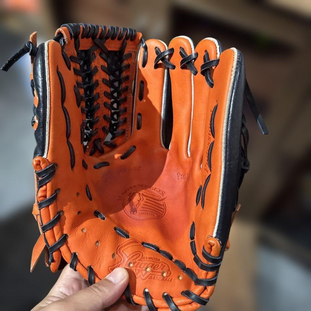 スラッガー　軟式グローブ 黒/オレンジ　湯揉み済み　新品