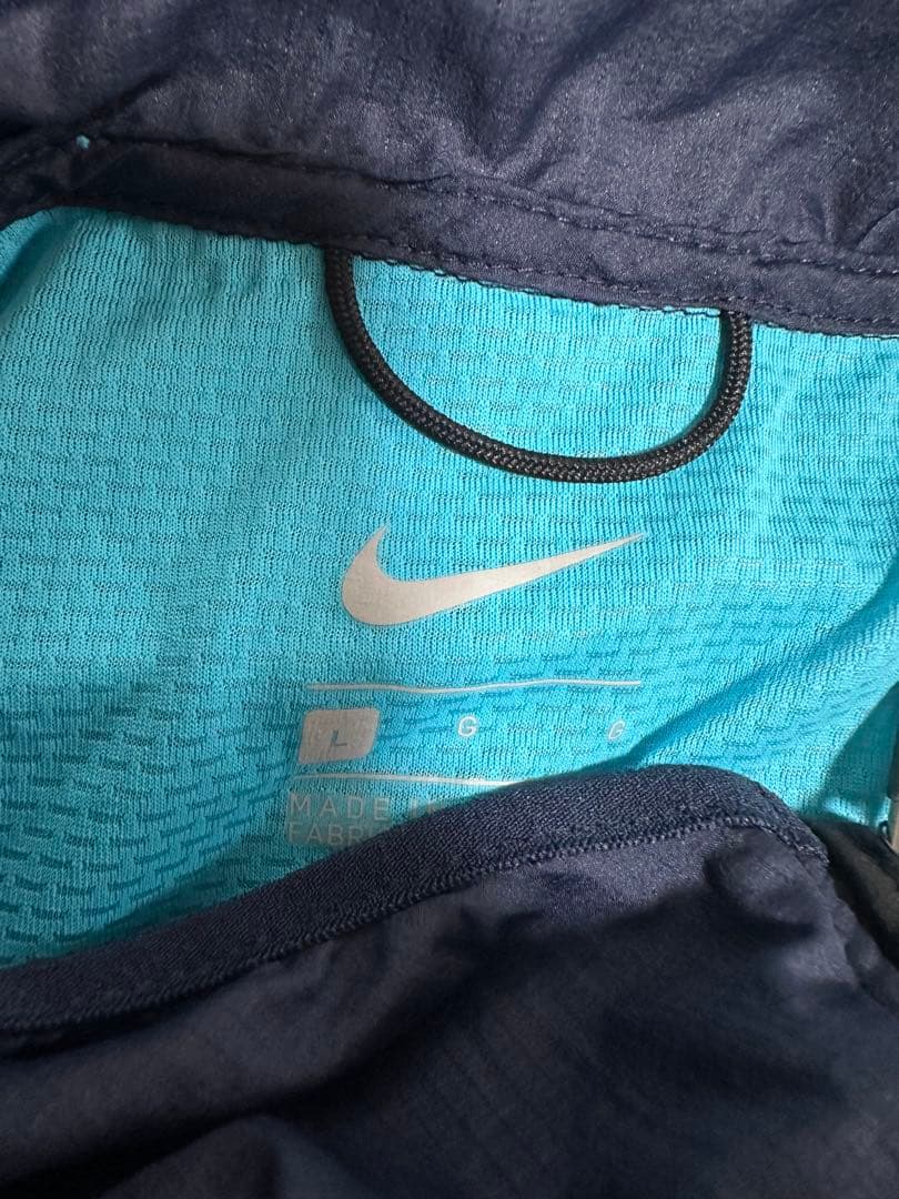 【未使用】NIKE ナイキランニングウェア　ウィンドブレーカーLサイズ